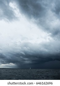 Sailboat In Stormy Weather With High Clouds