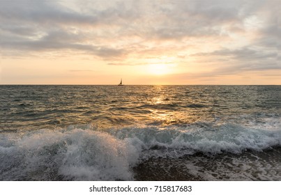 sailboat ocean sunset