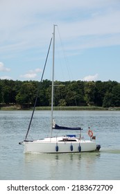 Sailboat Swimming With An Engine - Side View