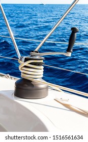 Sailboat Winch and Rope Yacht detail. Yachting. Sailing on the sea. Close Up on yacht cord crank, yachting sport, sailboat detail, summer vacation concept
