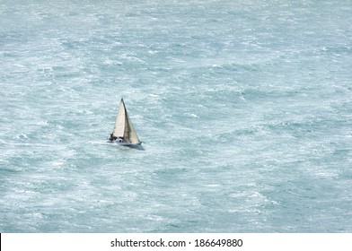 Sailboat With Wind And A Rough Sea