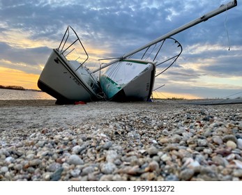 Sailboats Beached On The Sandy Coast Of Connecticut.