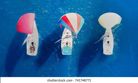 Sailboats - Colorful Top Down Aerial View - Rainbow Balloon Sail Of Threesome
Sailboats Sailing At Sea 