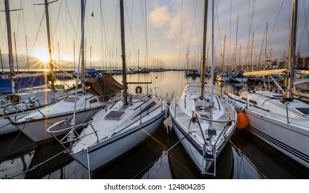 Sailboats Dan Sunrise At Versoix Marina, Lake Geneva, Switzerland