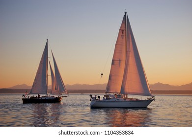 Sailboats In Elliot Bay At Sunset Near Seattle, Washington USA