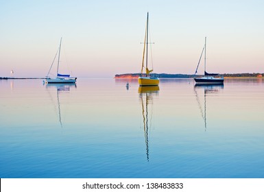 Sailboats in the Harbor on a calm summer evening.