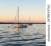 Sailboats on Lake Mendota at the Memorial Union in Madison Wisconsin at Sunset