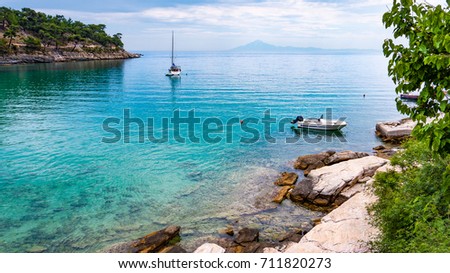 Sailing boat in the bay of the beautiful Aliki beach, Thassos island, Greece