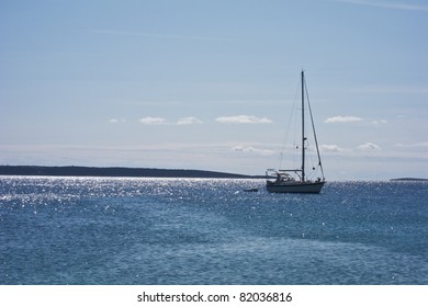 sailing boat in blue crystal water in croatia