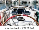 Sailing boat helm station with navigational instruments