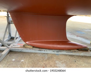 Sailing Boat Keel Freshly Painted With Red Antifouling Paint