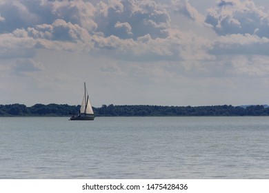 Sailing Boat On Beautiful Lake Balaton, Hungary On A Hot Summer Day, Copy Space.