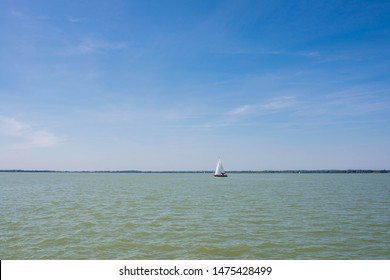 Sailing Boat On Beautiful Lake Balaton, Hungary On A Hot Summer Day, Copy Space.