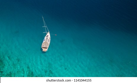 Sailing Boat On Open Water, Aerial View. Active Life Style, Water Transportation And Marine Sport.