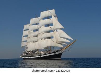 Sailing boat on the sea and blue sky
