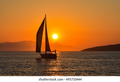 Sailing Boat On The Sea At Sunset.