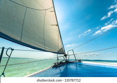 Sailing Boat On The Water In Sunshine