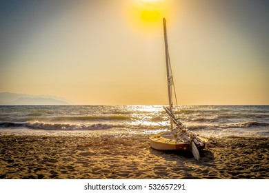 Sailing Boat Sunset On The Beach