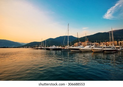 Sailing boats and yachts in marina at sunset. Tivat. Montenegro - Powered by Shutterstock