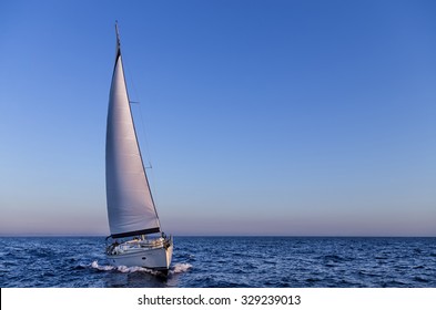 Sailing in the dusk in the Aegean sea, Greece - Powered by Shutterstock