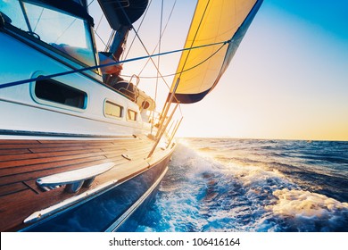 sailing into the sunset - Shutterstock ID 106416164