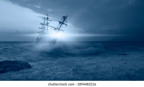 Sailing old ship in storm sea in the background stormy clouds
