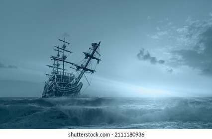 Sailing Old Ship In Storm Sea Against Dramatic Sunset