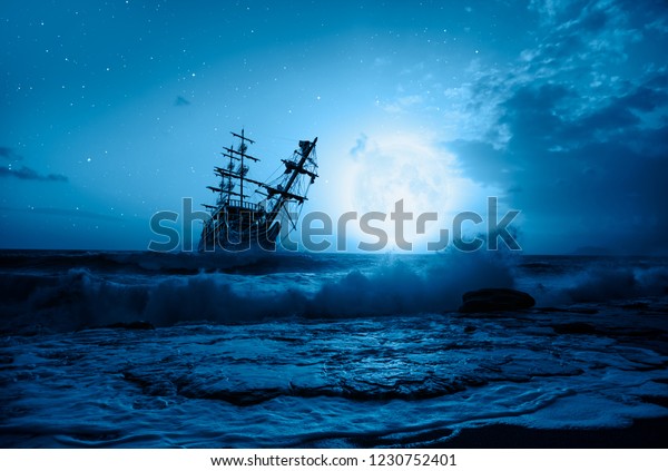 Sailing old\
ship in storm sea - Night sky with moon in the clouds \