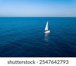 Sailing sailboat in Mediterranean sea near Ashkelon, Israel. Seascape on a morning.