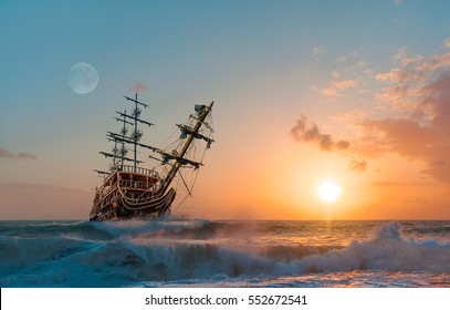 Sailing Ship In Storm Sea Against Heavy Sunset Clouds