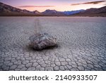 Sailing Stone Sitss At The End Of The Mud Path At Sunset On The Racetrack Playa in Death Valley