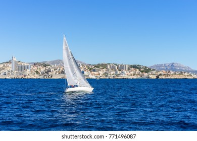 Sailing in the wind through the waves at the Sea