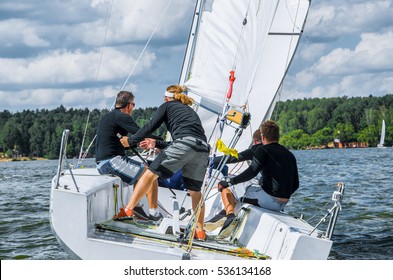 Sailing Yacht Race, Regatta. Sailboat. Team Athletes Participating In The Sailing Competition.