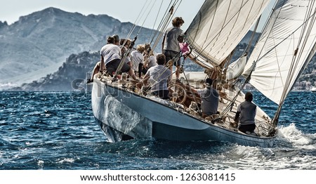 Sailing yacht race regatta. Sailboat in the sea under sail. Yachting sport
