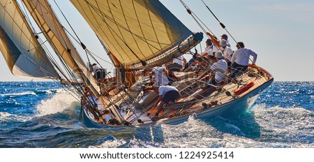 Sailing yacht race. Sports team of yachtsmen is fighting to win the regatta