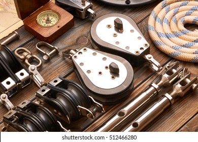 Sailing Yacht Rigging Equipment On Wooden Background 