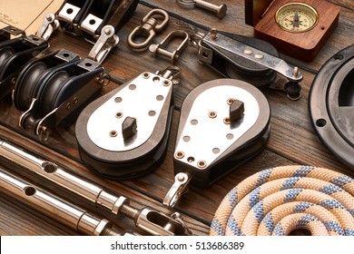 Sailing Yacht Rigging Equipment On Wooden Background 