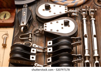 Sailing Yacht Rigging Equipment On Wooden Background 