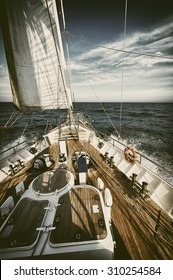 Sailing Yacht In A Storm.  Toned Image And Blur. Retro Style Postcard. Sailing. Yachting. Travel 