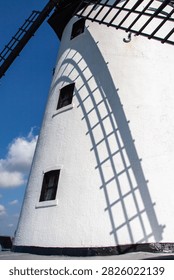 The sails of Lytham Windmill cast a shadow