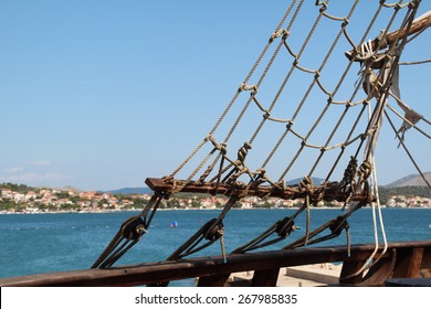 Sails / Sails Of A Pirate Ship On A Background Of Blue Sky