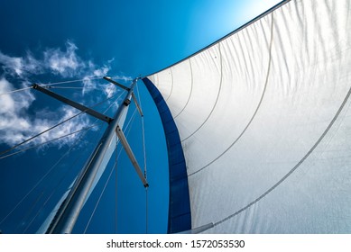 sails of a sailing yacht in the wind sailing on the ocean - Shutterstock ID 1572053530