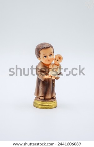 Saint Anthony and Child Jesus catholic statue on the white background