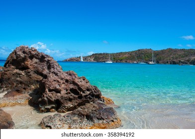 Saint Barthelemy (St Barth, St. Barths Or St. Barts), April 14, 2015: Sailboats Moored In The Secluded Colombier Beach, Called Rockefeller Beach Because David Rockefeller Owned The Property Around It