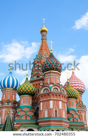 Saint Basil's Cathedral top part with blue clear sky,  church in the Red Square in Moscow, Russia.