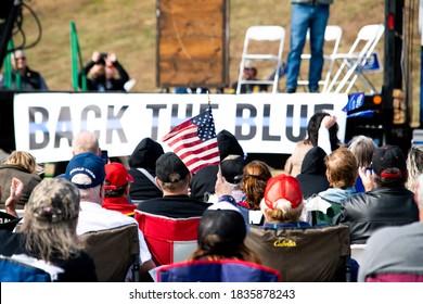SAINT CHARLES, MISSOURI - October 17, 2020: Attendees of a Back the Blue rally cheer as a speaker delivers his message. Back the Blue and Blue Lives Matter is a response to anti-cop sentiment.