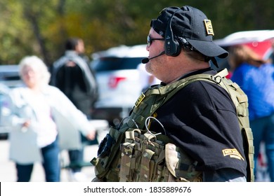 SAINT CHARLES, MISSOURI - October 17, 2020: A Member Of The Oath Keepers Right-wing Militia Group Wearing A Tactical Vest Attends A Back The Blue Rally.