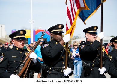 SAINT CHARLES, MISSOURI - October 17, 2020: Members Of The Saint Charles County Sheriff’s Department Honor Guard Present The US And Missouri Flags At A Back The Blue Rally.