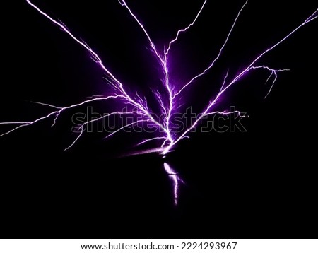 Saint elmo's fire.Lightning strike on airplane cockpit window during flying through thunderstorm clouds. Saint elmo's light. Weather phenomenon in which luminous plasma created by corona discharge. 