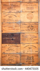 SAINT EMILION, FRANCE - AUGUST 19: Collection of old famous Bordeaux wine wood boxes, on August 19, 2015, in Saint Emilion